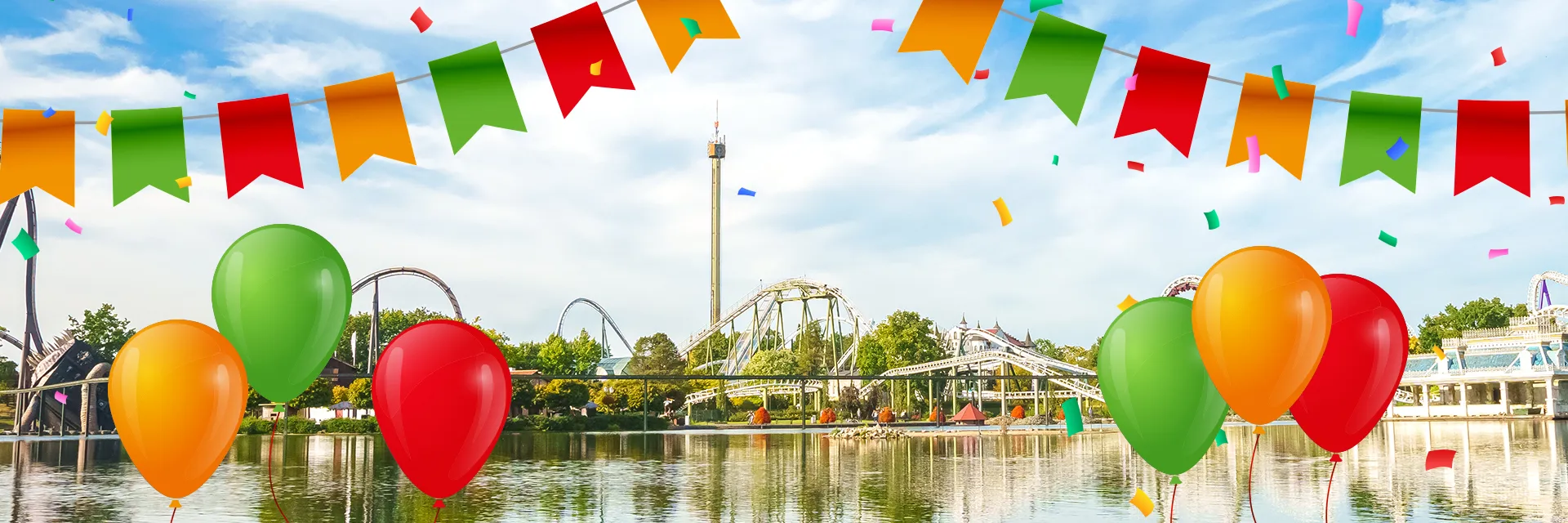 Skyline des Heide Park Resorts mit Luftballons, Konfetti und Wimpeln