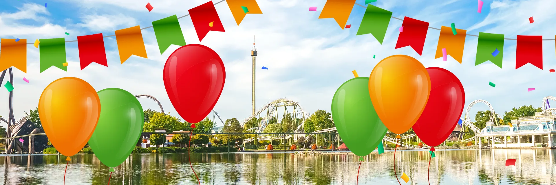 Skyline Heide Park Resort mit bunten Luftballons, Konfetti und Wimpelketten